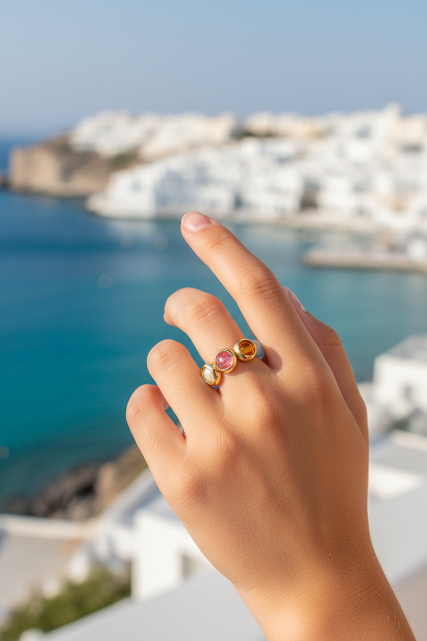 AQUAMARINE STRETCH RING WITH GOLD-FRAMED BEADS
