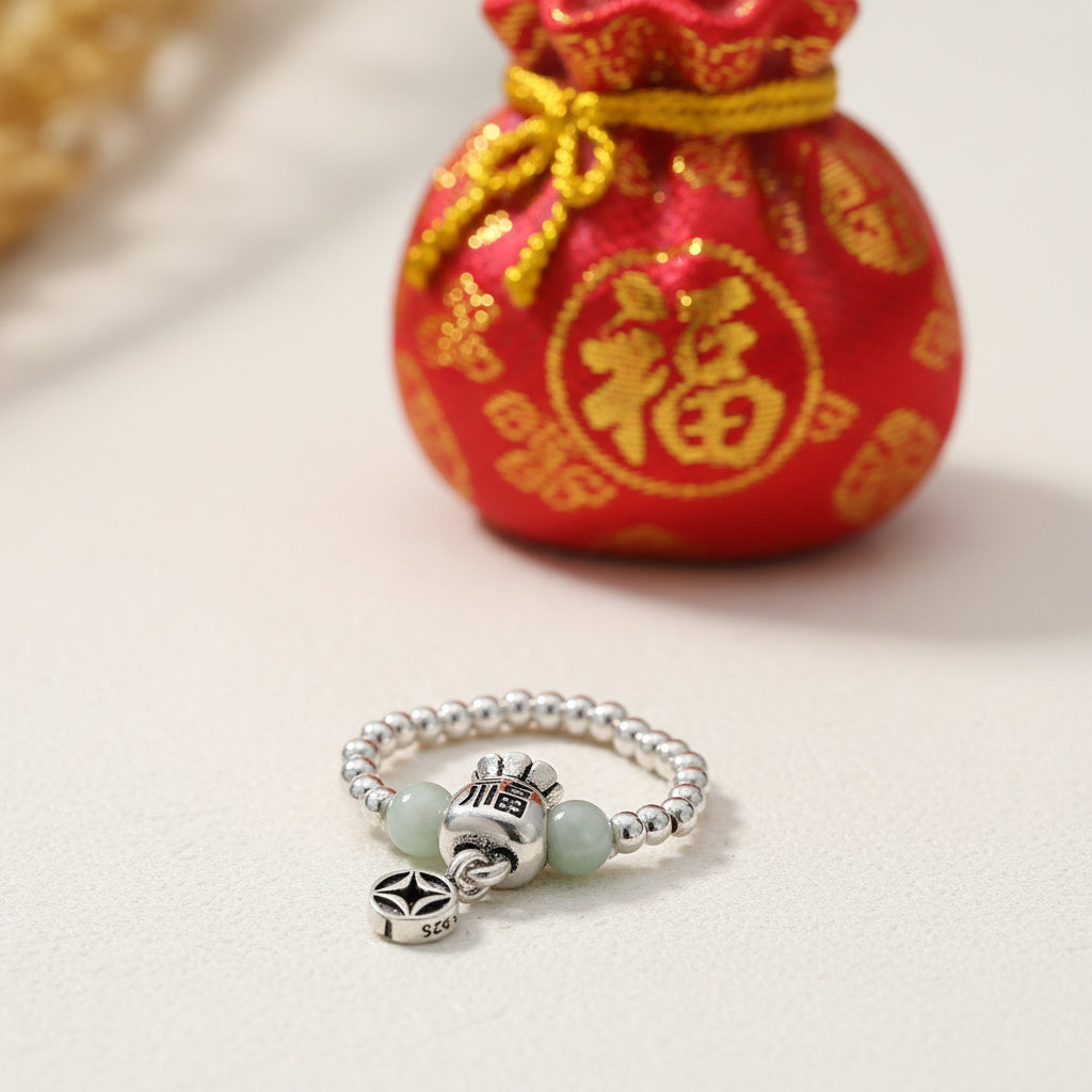 FORTUNE BAG STERLING SILVER STRETCH RING