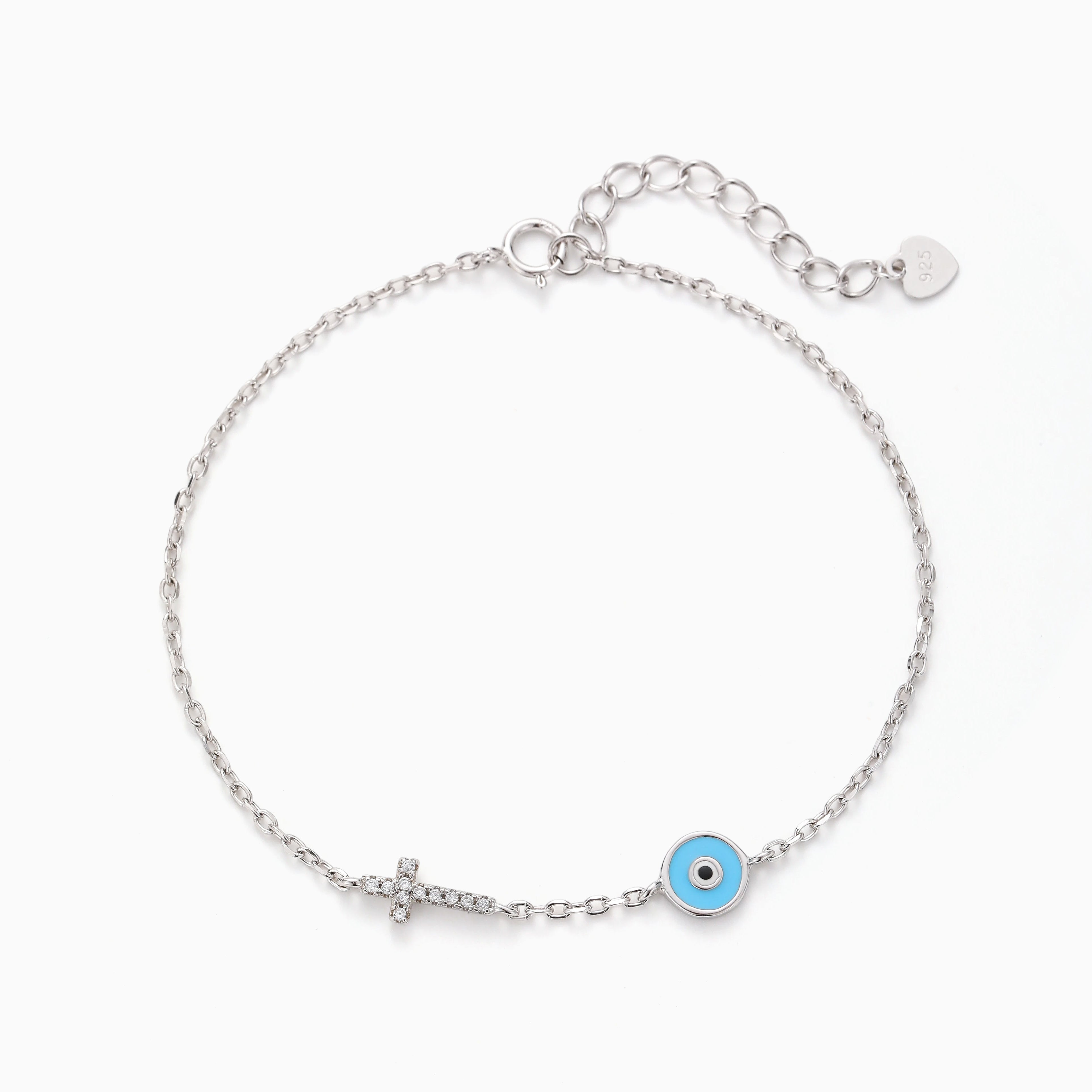 LIGHT BLUE EVIL EYE AND CROSS BRACELET