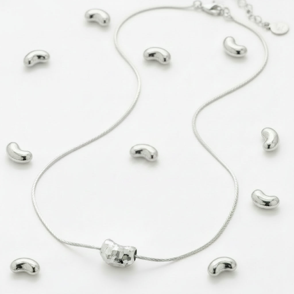 FORM STUDY LASER CUT BEAN PENDANT NECKLACE WITH HIGH REFLECTIVE SHINE