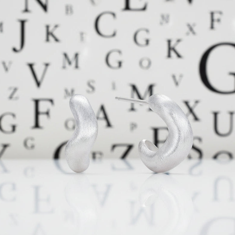 FORM STUDY BRUSHED SWAGGY MACARONI HOOP EARRINGS