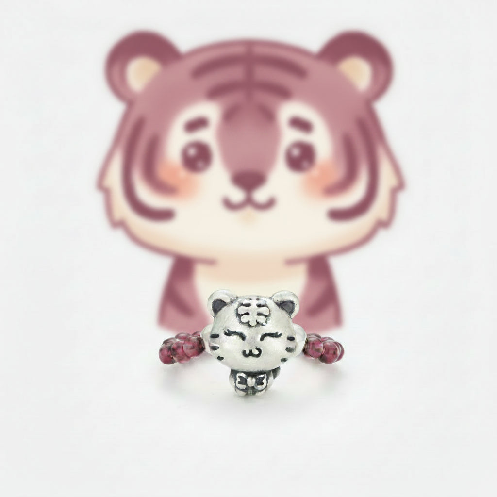 PURPLE GARNET STRETCH RING WITH STERLING SILVER TIGER CHARM