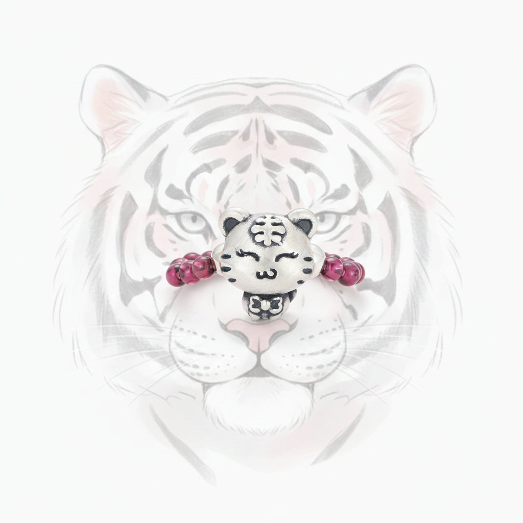 PURPLE GARNET STRETCH RING WITH STERLING SILVER TIGER CHARM