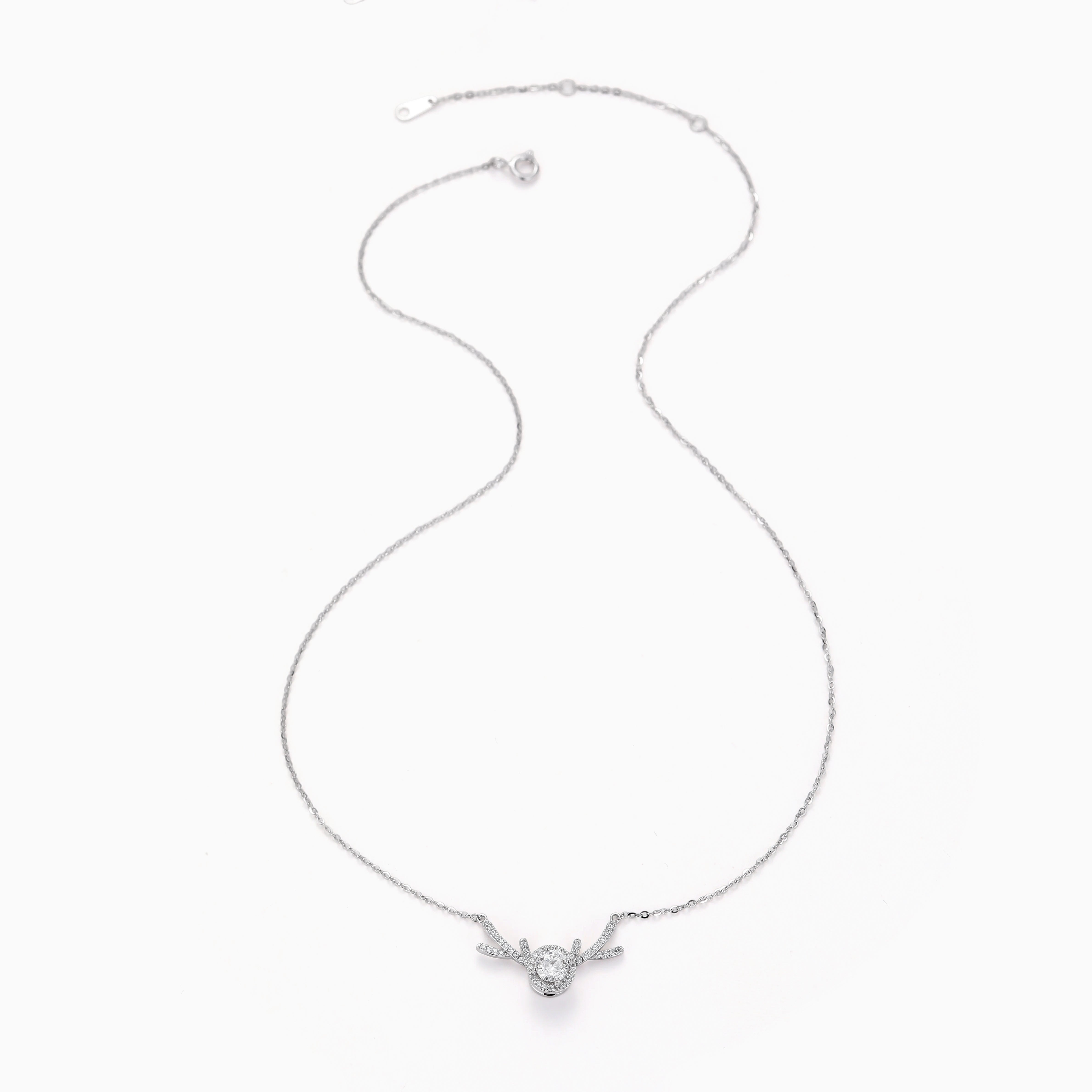 SPINNING MOISSANITE PENDANT NECKLACE WITH DEER ANTLER DETAILING