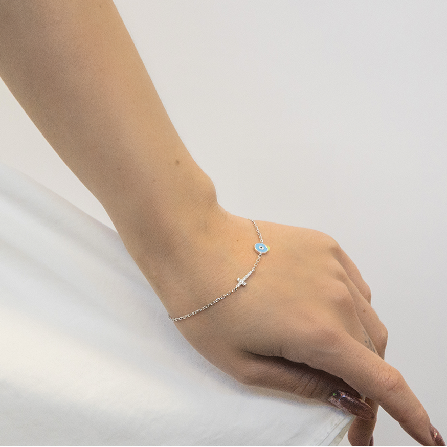 Dual protection charm bracelet worn on wrist