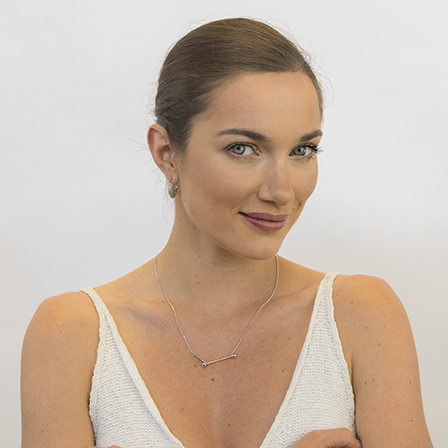 Sleek sterling silver chain necklace worn showing length