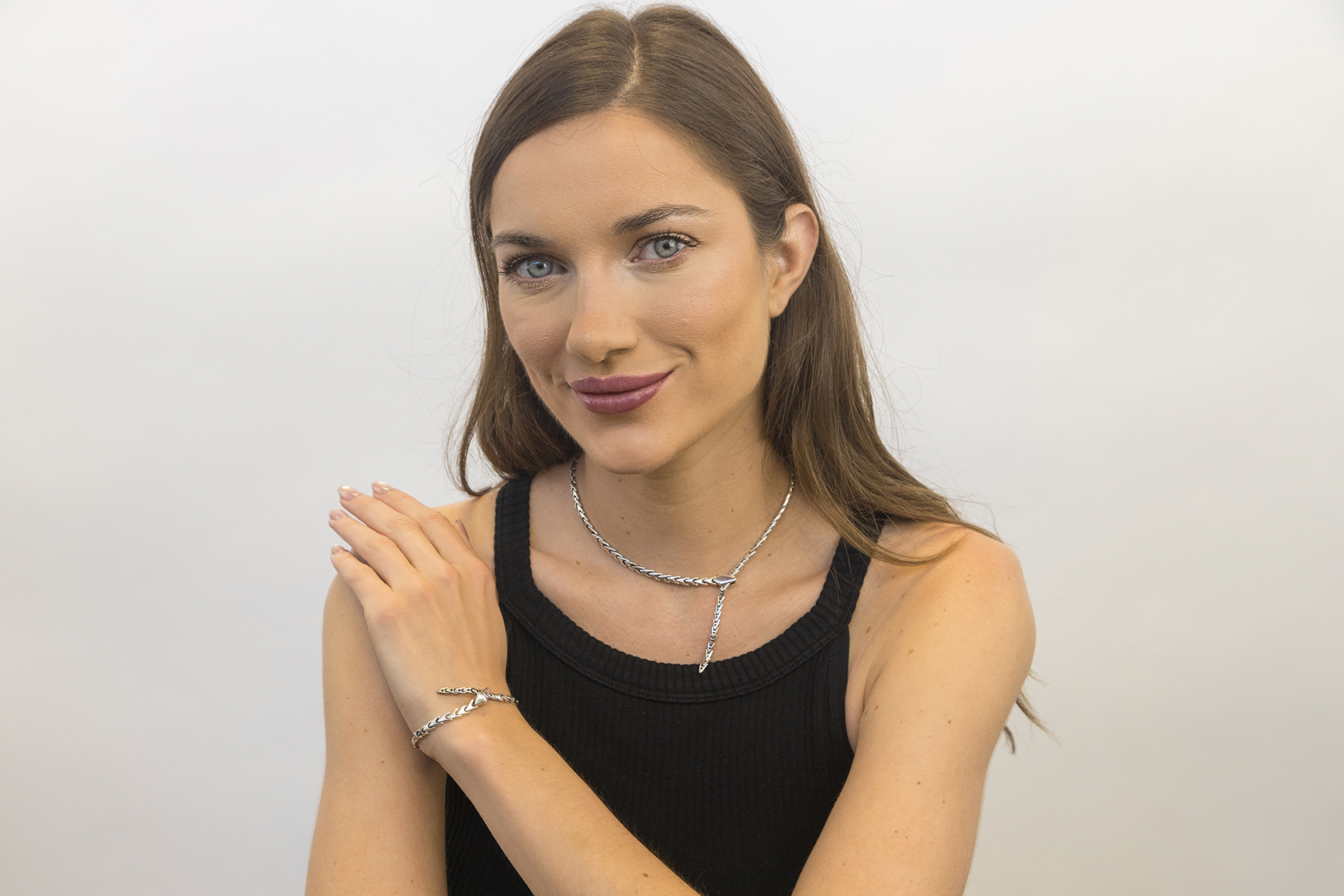 Snake chain necklace worn showing elegant drape and length
