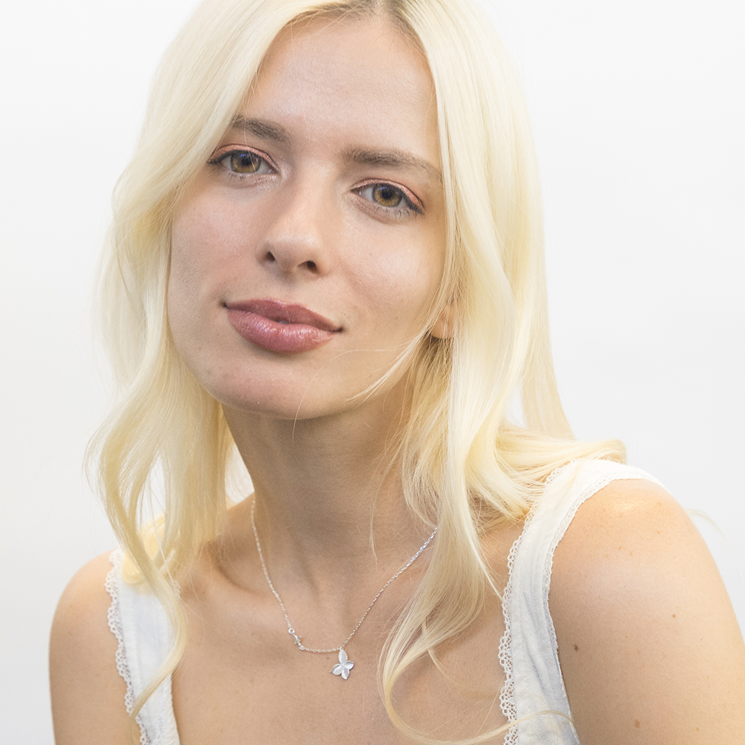 Butterfly necklace worn showing length and elegant drape